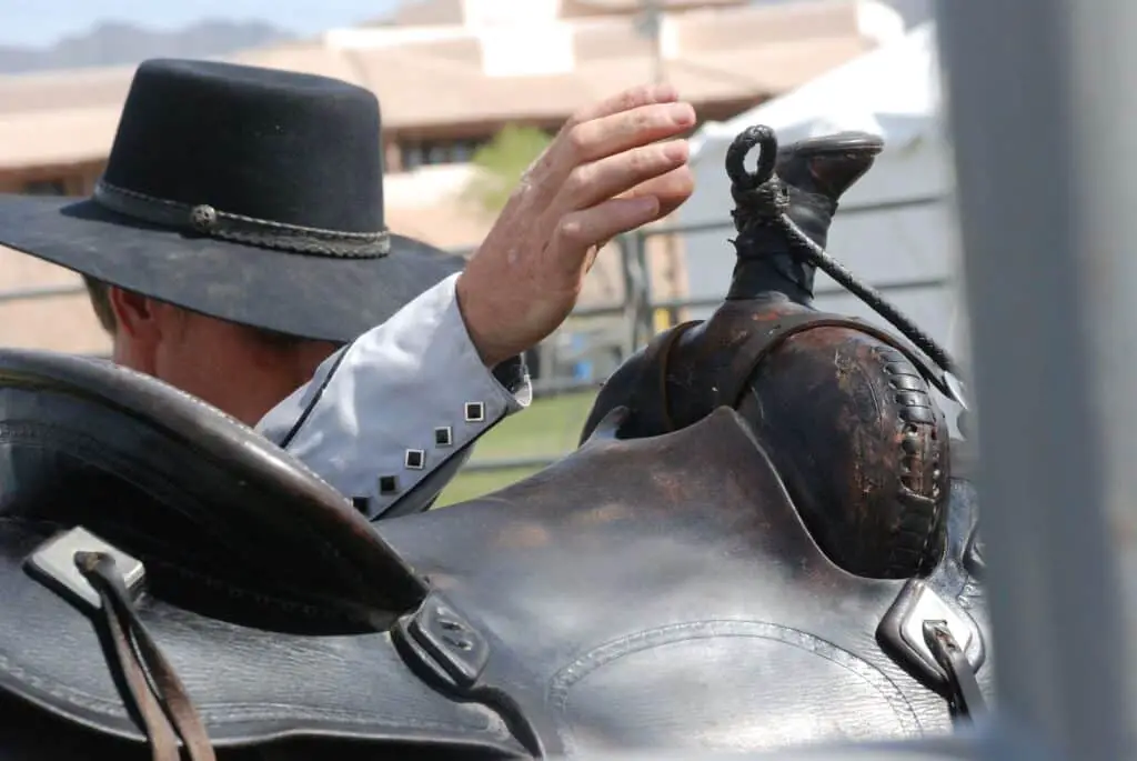 Cowboy Mounting His Horse, Western Horseback Riding